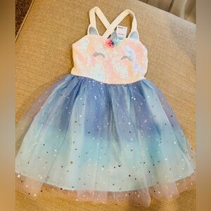 Unicorn party dress for kids. Rainbow colored. Tulle skin. sequined top.